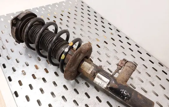 Volkswagen Golf VI Front shock absorber with coil spring 1T0413031HC