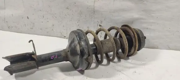 Renault Clio II Front shock absorber with coil spring 8200662261 7700421610 20633307