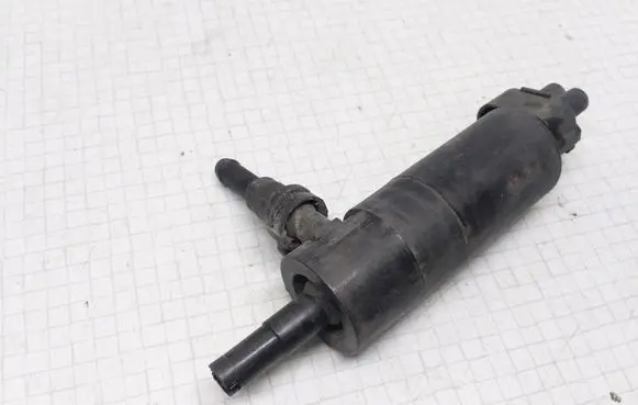 Nissan Primera Headlight washer pump 