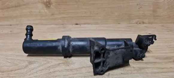 Headlight washer spray nozzle