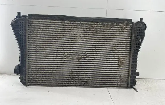 Volkswagen Golf V Intercooler radiator 1K0145803L