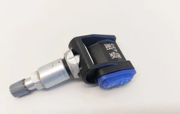 Mercedes-Benz C W206 Tire pressure sensor A0009058413