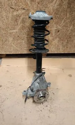 Front wheel hub spindle knuckle
