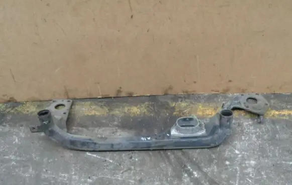 Radiator support slam panel bracket
