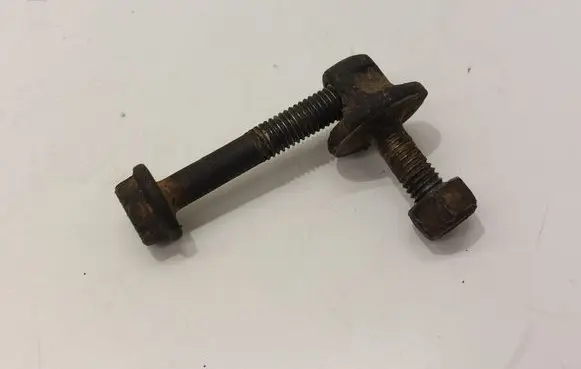 Power steering belt tensioner