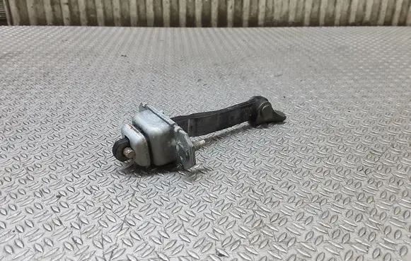 Subaru Forester SF Front door check strap stopper