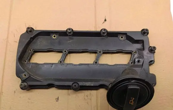 Rocker cam cover
