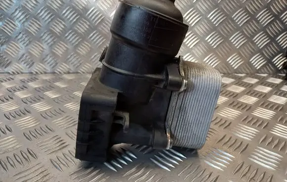 Volkswagen PASSAT B7 Oil filter mounting bracket 03L115389C 03L117021C