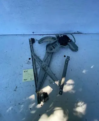 Nissan Micra Front door window regulator with motor 