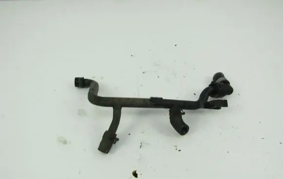 Volkswagen PASSAT B5.5 Engine coolant pipe/hose 06B121065L