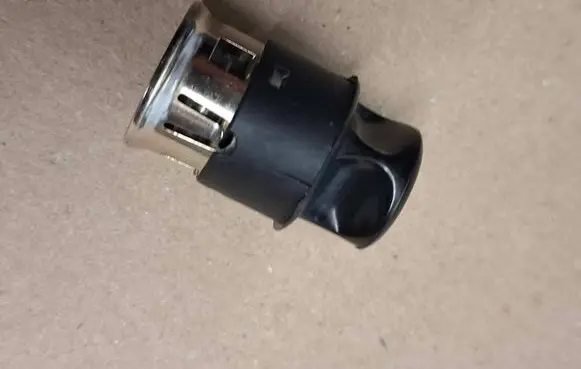Mercedes-Benz W123 Cigarette lighter front 