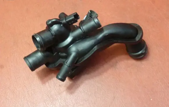 Thermostat/thermostat housing