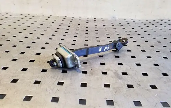Front door check strap stopper
