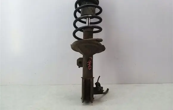 Front shock absorber with coil spring