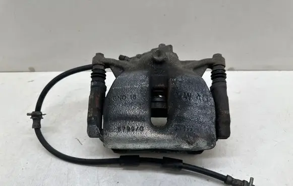 Volkswagen Caddy Front brake caliper 