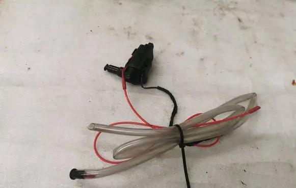Fuel tank cap lock motor