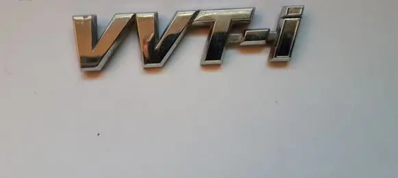 Toyota Corolla E120 E130 Manufacturers badge/model letters 