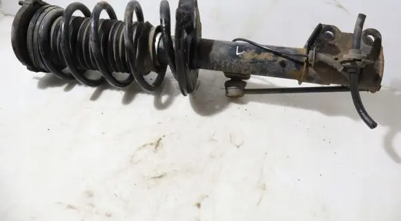 Front shock absorber with coil spring