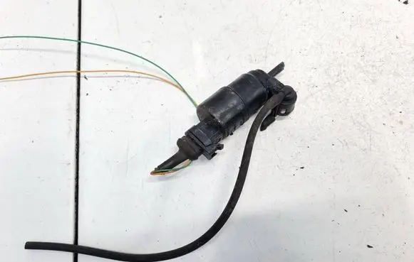 Renault Megane I Windscreen/windshield washer pump 7700821782