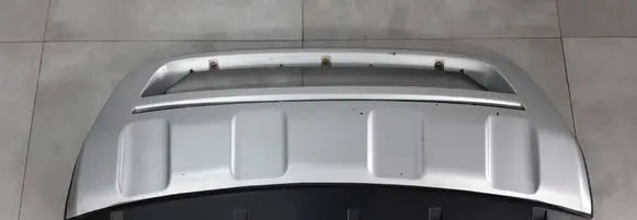 Renault Koleos I Front bumper lip 7711423553