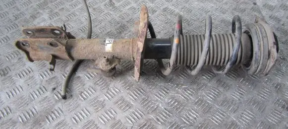 Nissan Juke I F15 Front shock absorber with coil spring