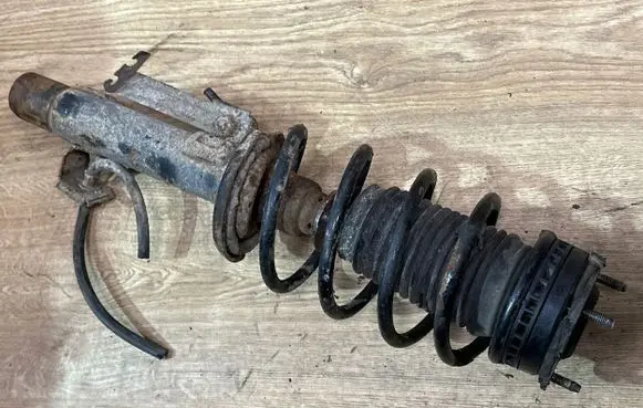 Mazda 2 Front shock absorber with coil spring