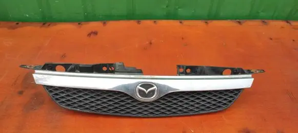 Mazda 323 Front bumper upper radiator grill BJ3D501T1D