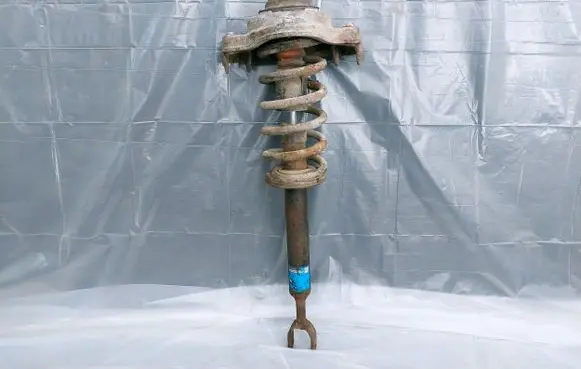 Audi A6 S6 C6 4F Front shock absorber with coil spring