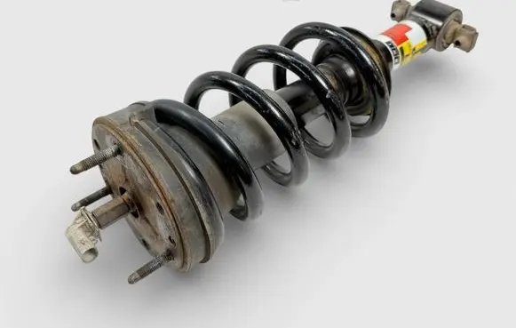 Cadillac Escalade Front shock absorber with coil spring 20810265 22253108
