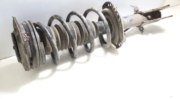 Volkswagen Jetta VI Front shock absorber with coil spring