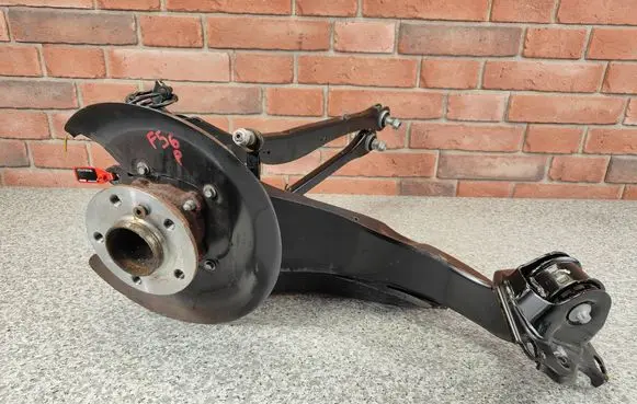 Rear wheel hub spindle/knuckle