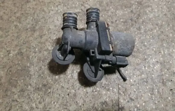 Coolant heater control valve