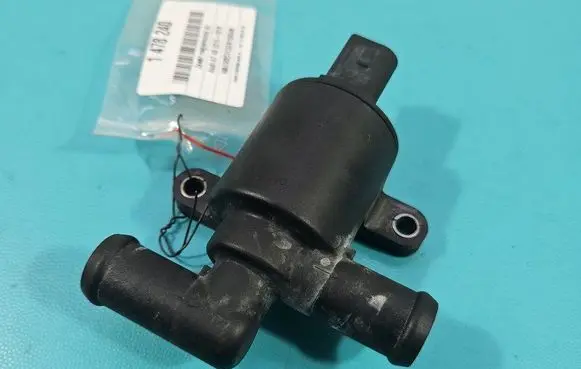 Coolant heater control valve