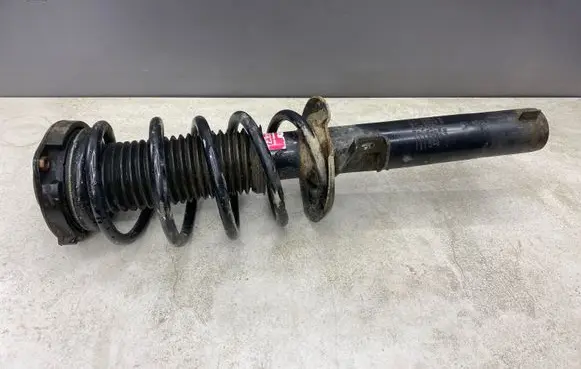 Volkswagen PASSAT B6 Front shock absorber with coil spring 335808