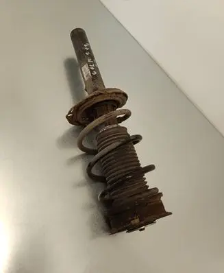 Volkswagen Golf VII Front shock absorber with coil spring 5Q0413023FJ