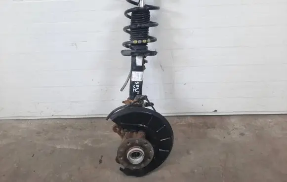 Volkswagen Golf VI Front shock absorber with coil spring