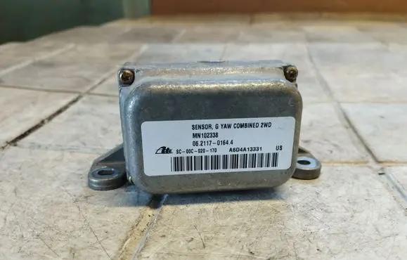 Mitsubishi Grandis ESP acceleration yaw rate sensor MN102338