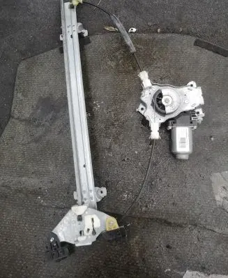 Nissan Navara D40 Front door window regulator with motor 402123B