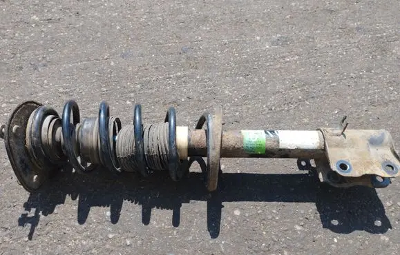 Mitsubishi Colt Front shock absorber with coil spring 4060A093