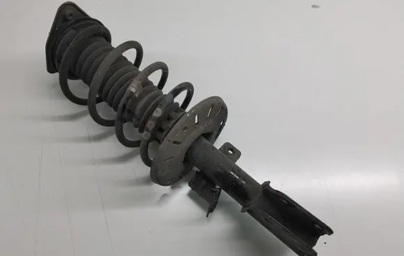 Citroen C4 II Picasso Front shock absorber/damper 9810539780