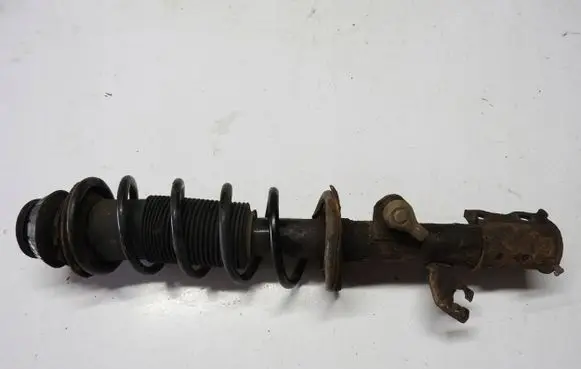 Nissan Note (E12) Front shock absorber with coil spring 8200973738