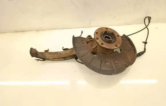 Volkswagen Touareg I Front wheel hub spindle knuckle 7L0407258A