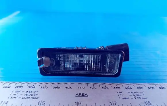 Volkswagen Golf VI Number plate light 1K8943021