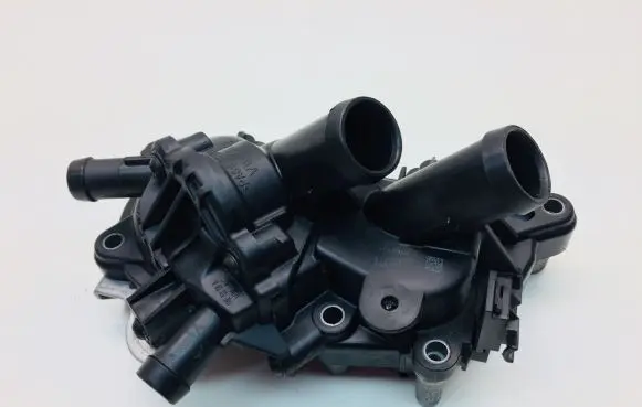 Thermostat/thermostat housing