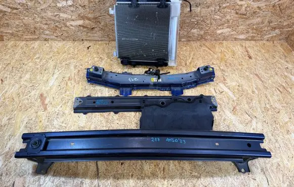 Radiator support slam panel