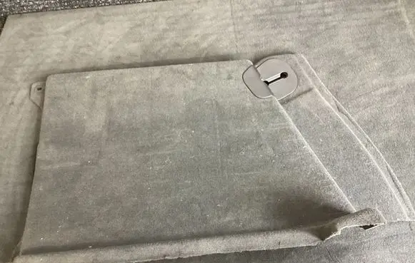 Trunk/boot lower side trim panel