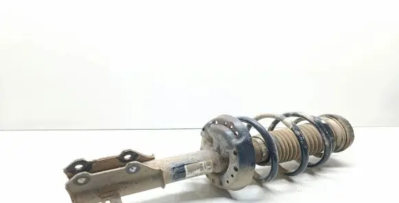 Opel Astra J Front shock absorber with coil spring 13354032