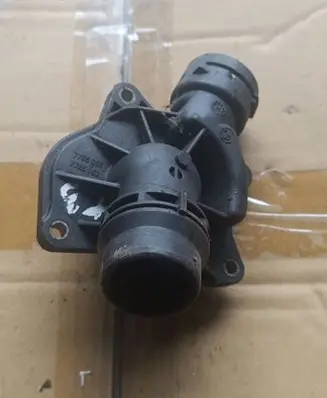 Thermostat/thermostat housing