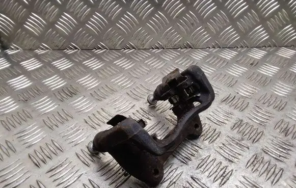 Mini One - Cooper Coupe R56 Brake caliper pad carrier rear 