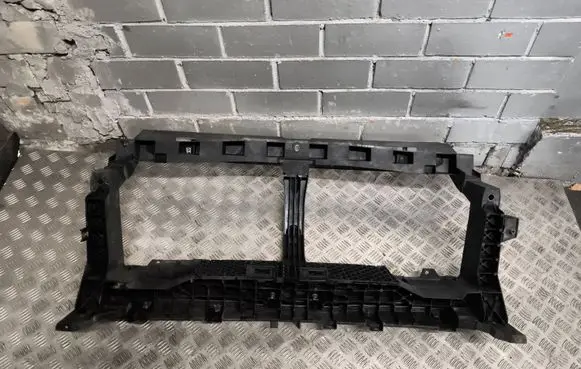 Radiator support slam panel